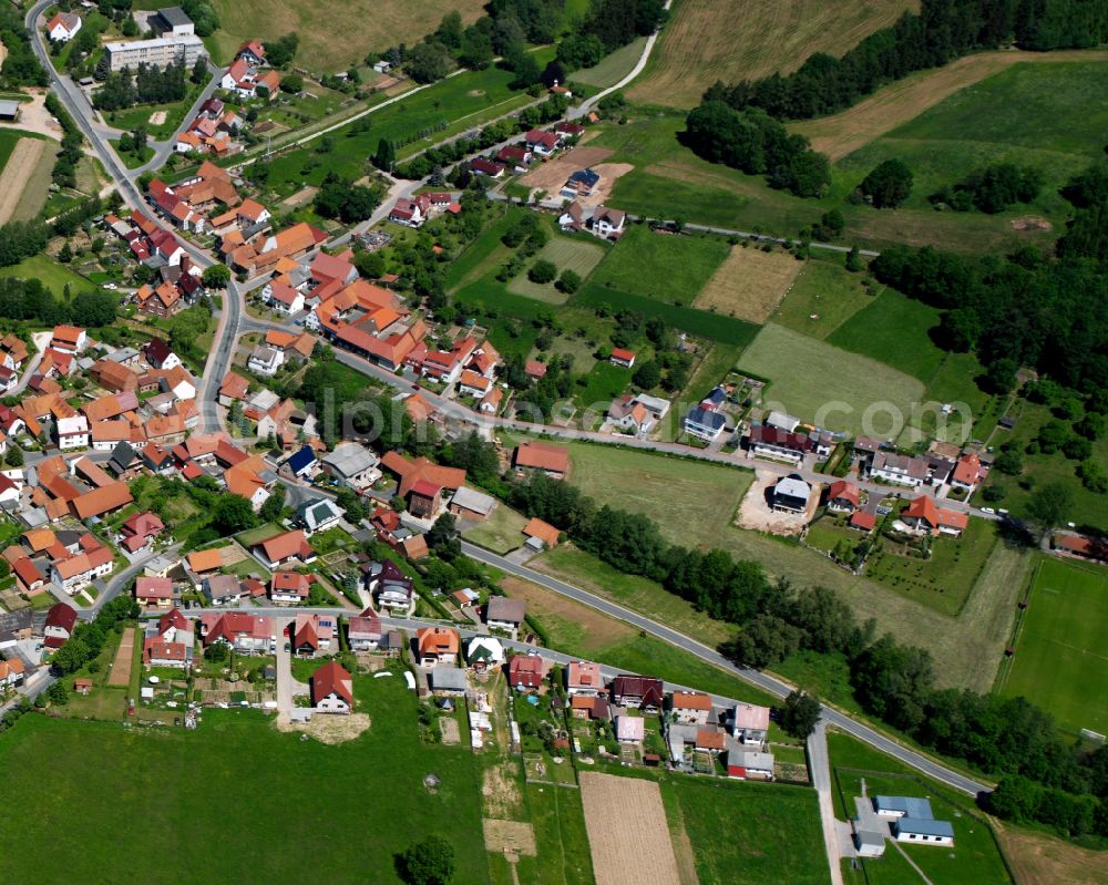 Aerial image Bodenrode - Agricultural land and field boundaries surround the settlement area of the village in Bodenrode in the state Thuringia, Germany