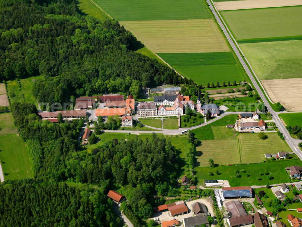 Bonlanden from above - Agricultural land and field boundaries surround the settlement area of the village in Bonlanden in the state Baden-Wuerttemberg, Germany