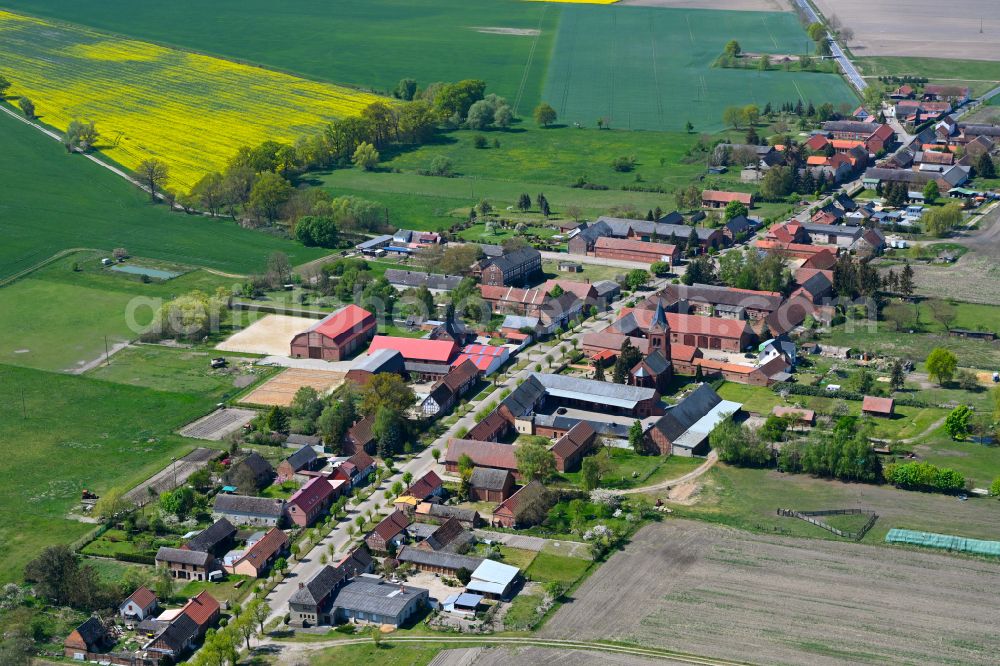 Boock from above - Agricultural land and field boundaries surround the settlement area of the village in Boock in the state Saxony-Anhalt, Germany