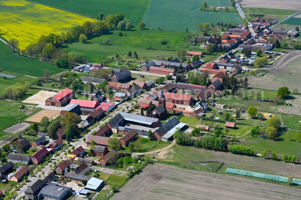 Boock from the bird's eye view: Agricultural land and field boundaries surround the settlement area of the village in Boock in the state Saxony-Anhalt, Germany