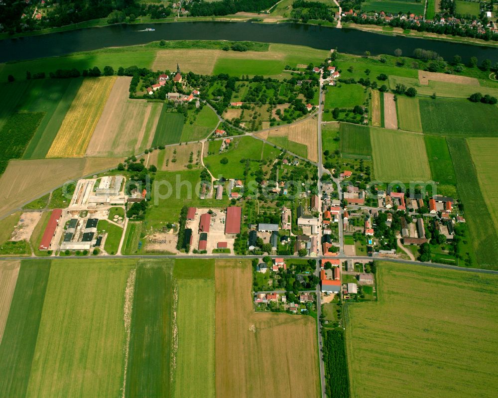 Boritz from above - Agricultural land and field boundaries surround the settlement area of the village in Boritz in the state Saxony, Germany