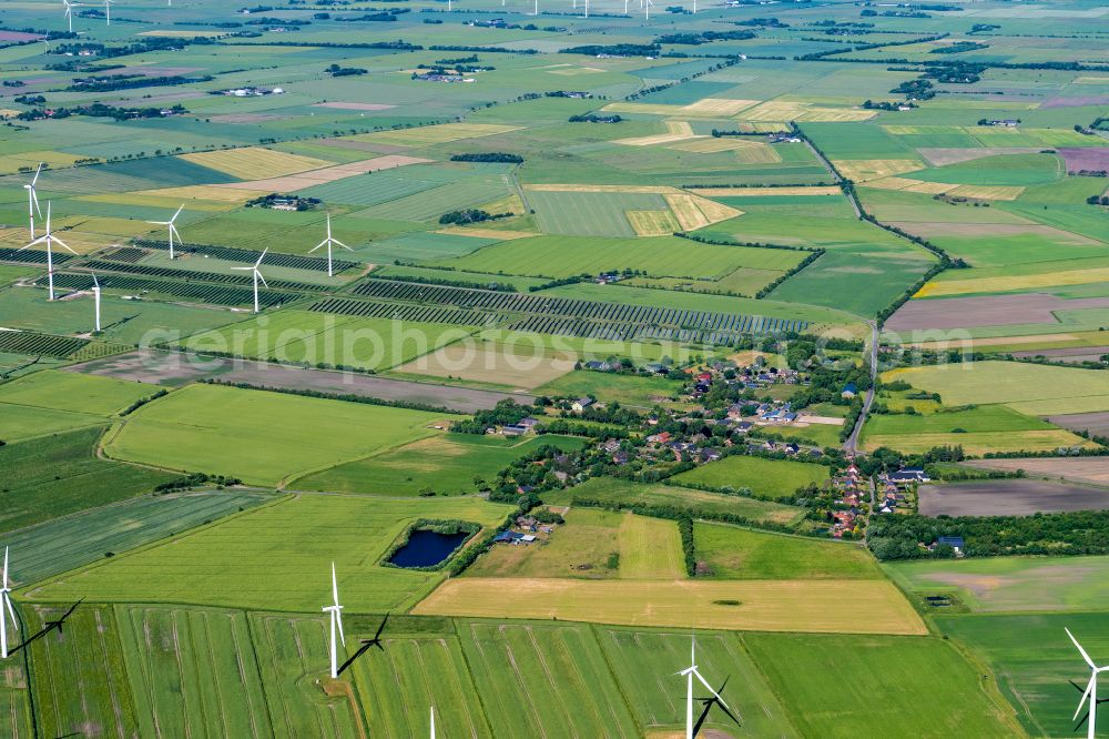 Aerial image Bosbüll - Agricultural land and field boundaries surround the settlement area of the village on street Hauptstrasse in Bosbuell in the state Schleswig-Holstein, Germany