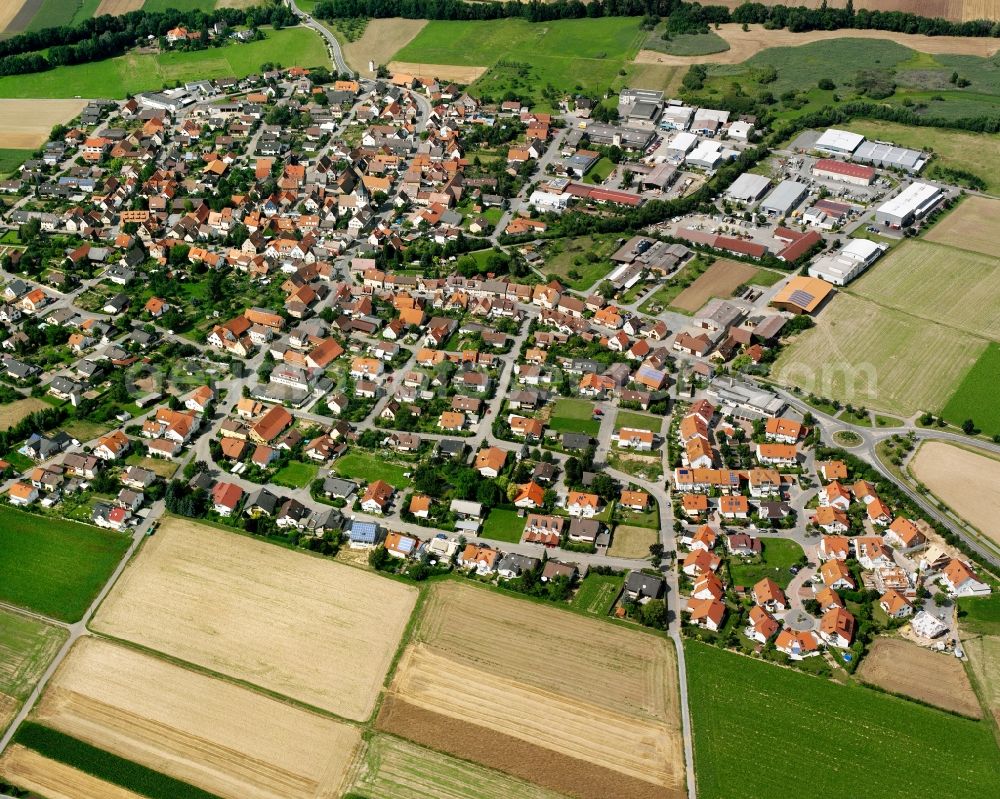 Botenheim from above - Agricultural land and field boundaries surround the settlement area of the village in Botenheim in the state Baden-Wuerttemberg, Germany