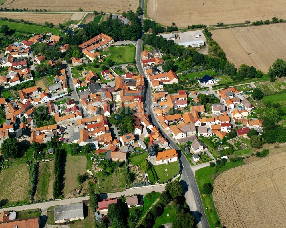 Bothenheilingen from the bird's eye view: Agricultural land and field boundaries surround the settlement area of the village in Bothenheilingen in the state Thuringia, Germany