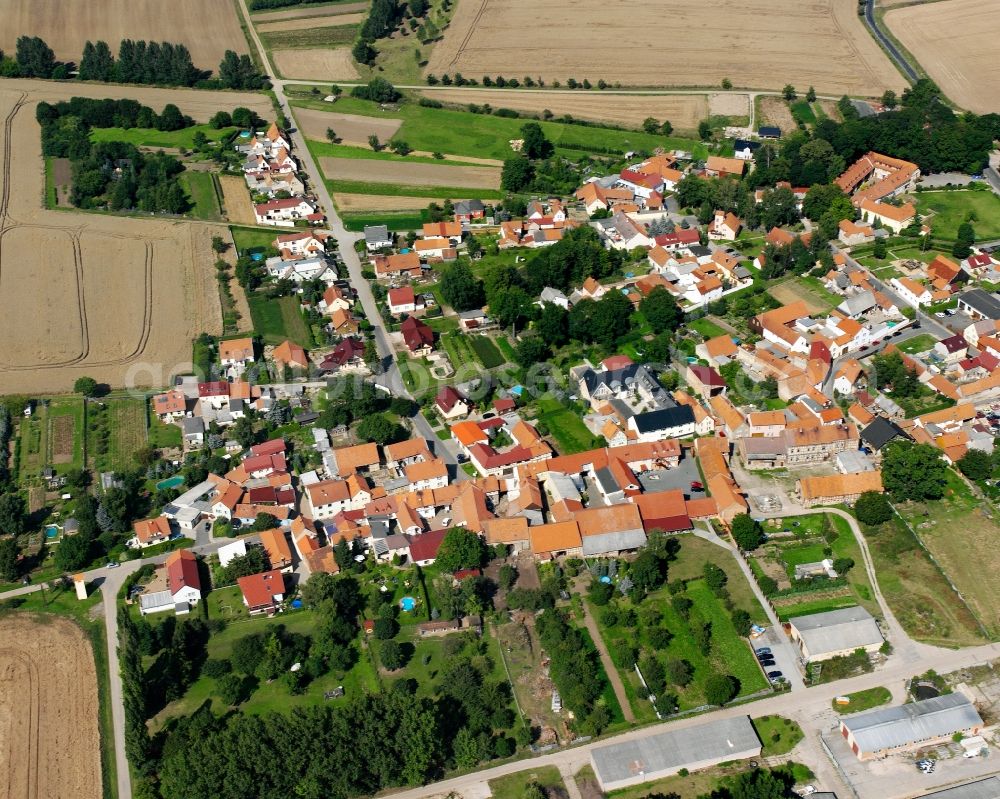 Aerial image Bothenheilingen - Agricultural land and field boundaries surround the settlement area of the village in Bothenheilingen in the state Thuringia, Germany