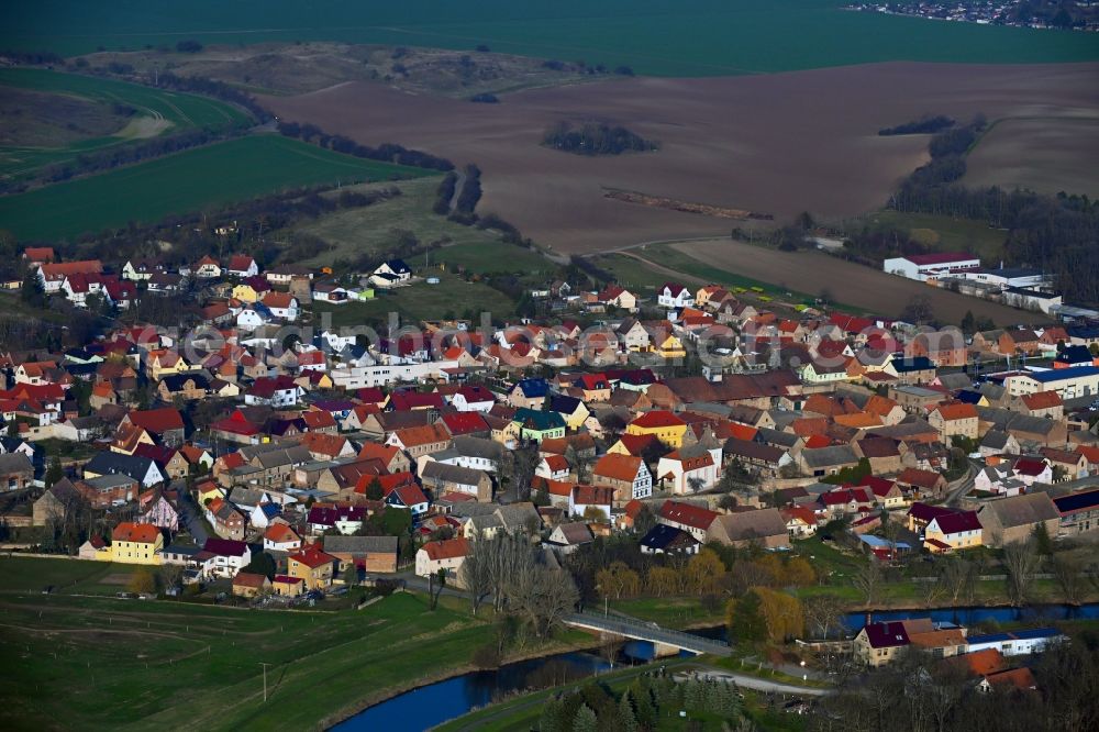 Bottendorf from above - Agricultural land and field boundaries surround the settlement area of the village in Bottendorf in the state Thuringia, Germany