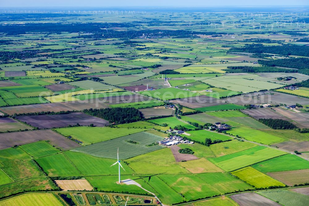 Boverstedt from above - Agricultural land and field boundaries surround the settlement area of the village in Boverstedt in the state Schleswig-Holstein, Germany