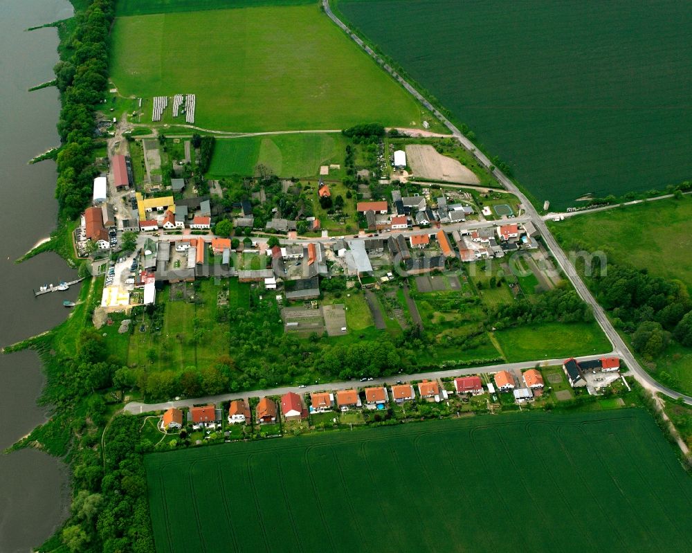 Aerial image Brambach - Agricultural land and field boundaries surround the settlement area of the village in Brambach in the state Saxony-Anhalt, Germany