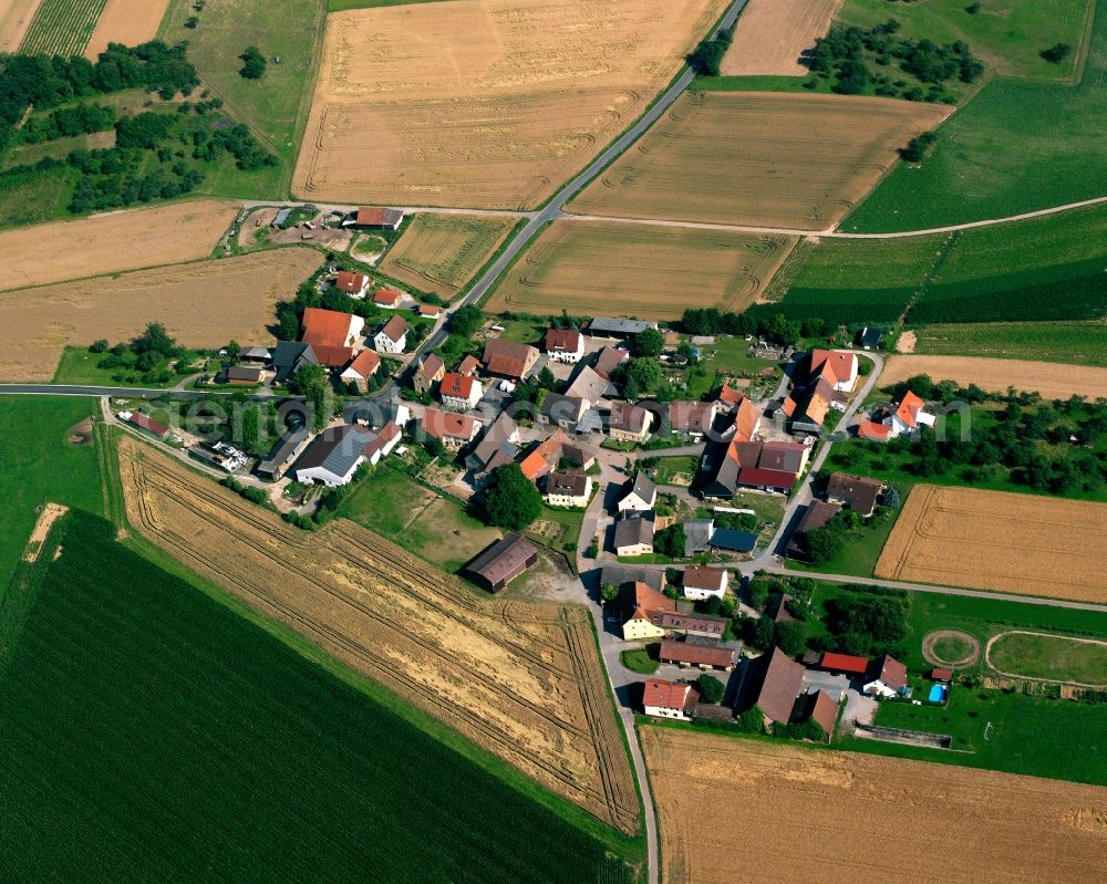 Aerial image Brambacher Hof - Agricultural land and field boundaries surround the settlement area of the village in Brambacher Hof in the state Baden-Wuerttemberg, Germany