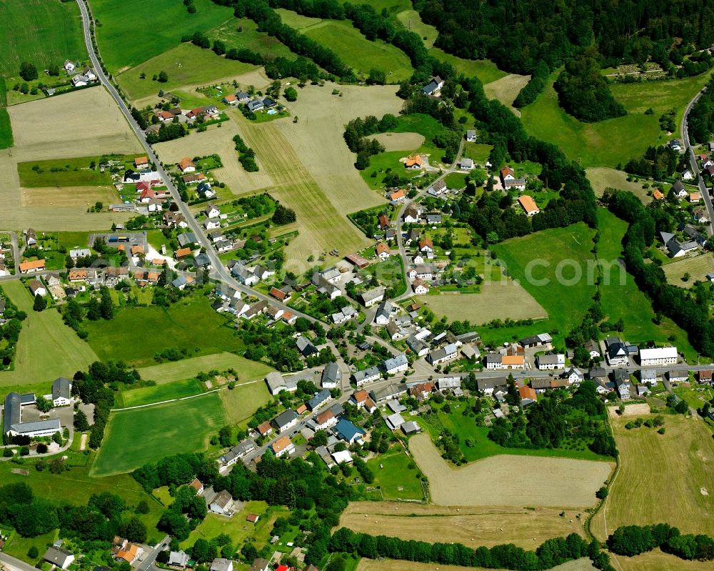 Brücken from above - Agricultural land and field boundaries surround the settlement area of the village in Brücken in the state Rhineland-Palatinate, Germany