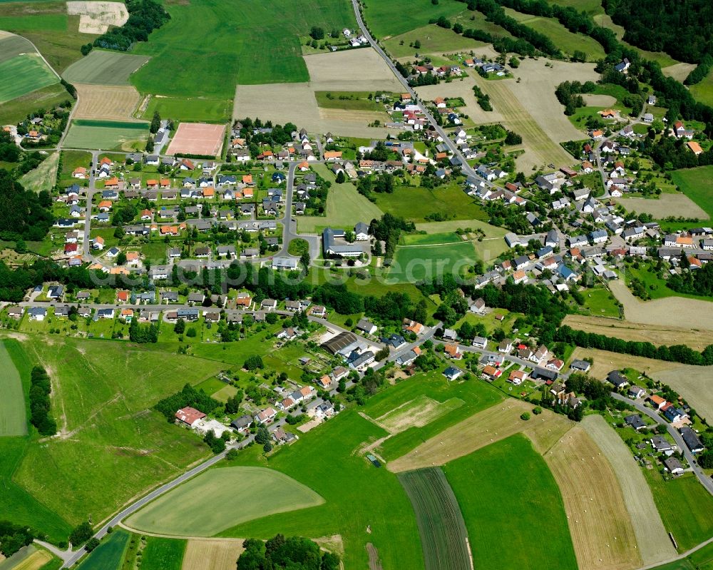 Brücken from the bird's eye view: Agricultural land and field boundaries surround the settlement area of the village in Brücken in the state Rhineland-Palatinate, Germany