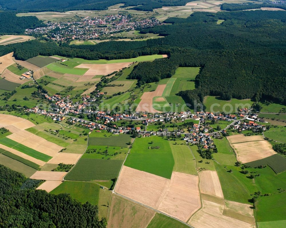 Aerial image Breitenbrunn - Agricultural land and field boundaries surround the settlement area of the village in Breitenbrunn in the state Hesse, Germany