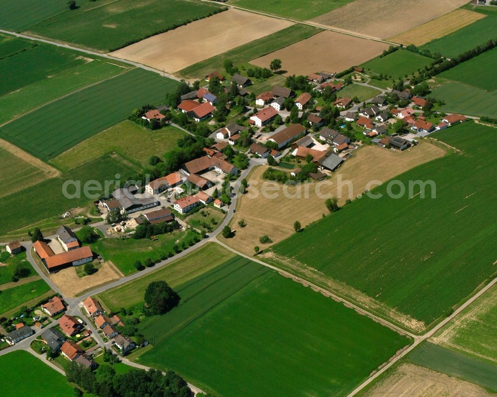 Breitenweinzier from above - Agricultural land and field boundaries surround the settlement area of the village in Breitenweinzier in the state Bavaria, Germany