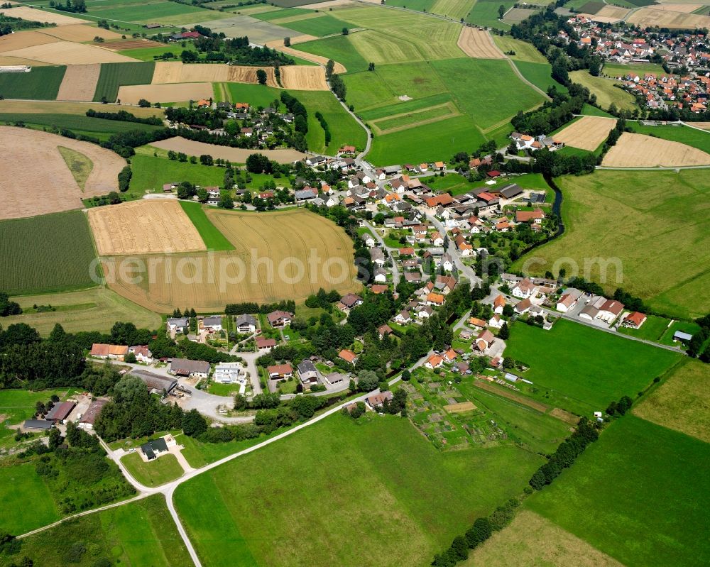 Bremen from above - Agricultural land and field boundaries surround the settlement area of the village in Bremen in the state Baden-Wuerttemberg, Germany