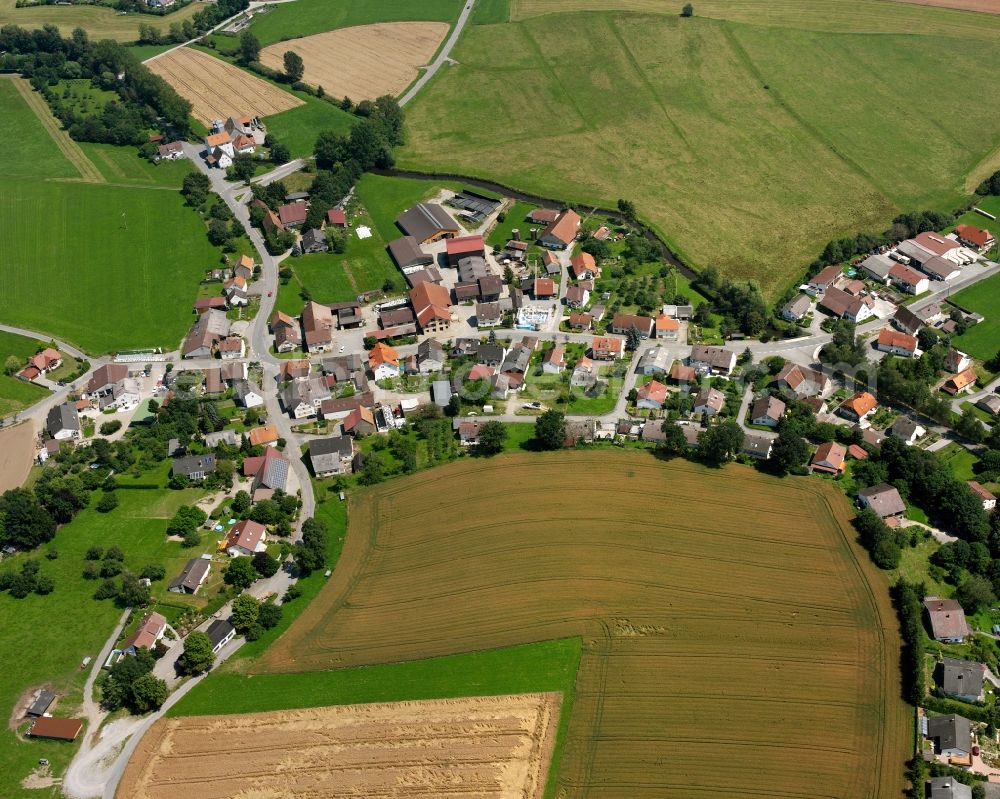 Bremen from the bird's eye view: Agricultural land and field boundaries surround the settlement area of the village in Bremen in the state Baden-Wuerttemberg, Germany