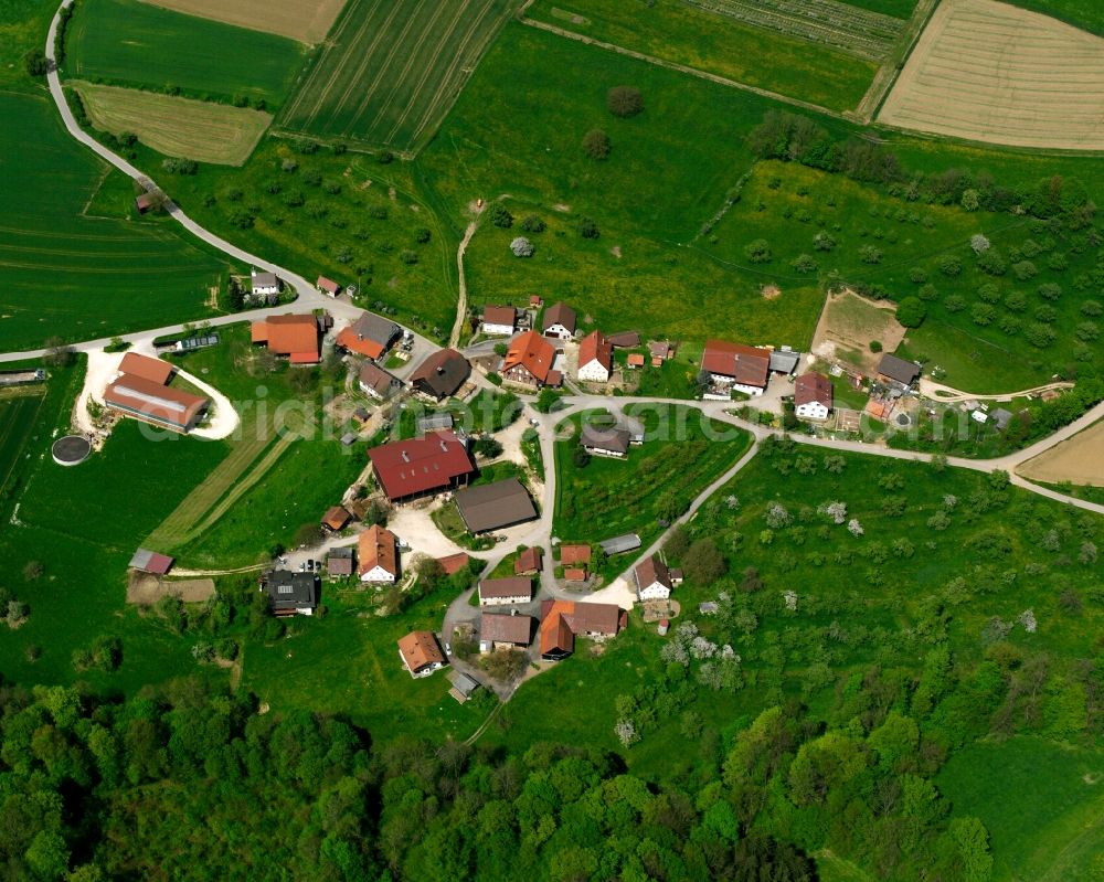 Bärenbach from the bird's eye view: Agricultural land and field boundaries surround the settlement area of the village in Bärenbach in the state Baden-Wuerttemberg, Germany