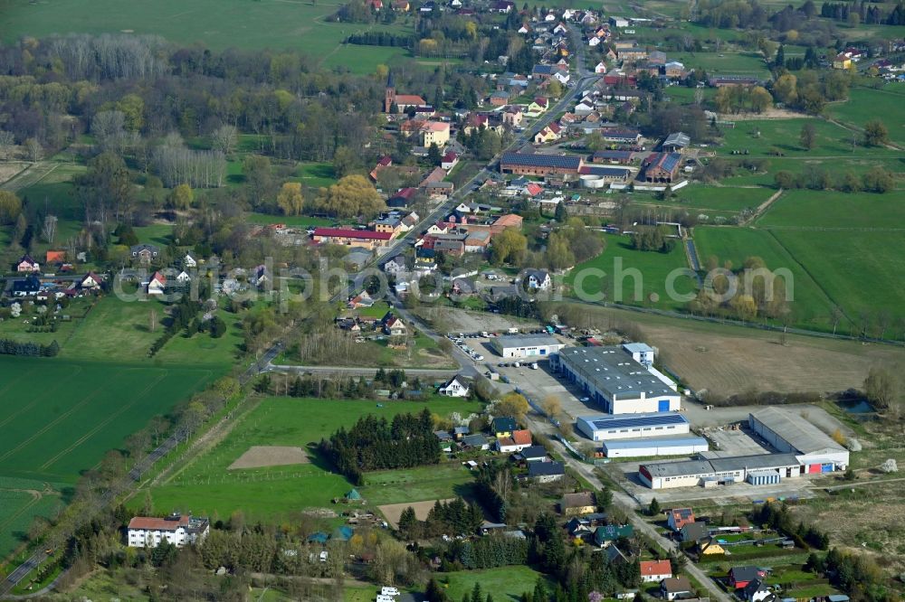 Aerial image Breydin - Agricultural land and field boundaries surround the settlement area of the village in Breydin in the state Brandenburg, Germany