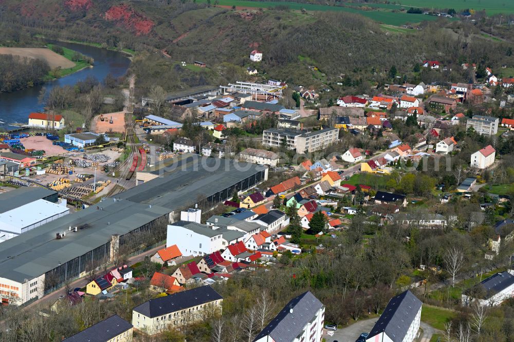 Aerial image Brucke - Agricultural land and field boundaries surround the settlement area of the village in Brucke in the state Saxony-Anhalt, Germany