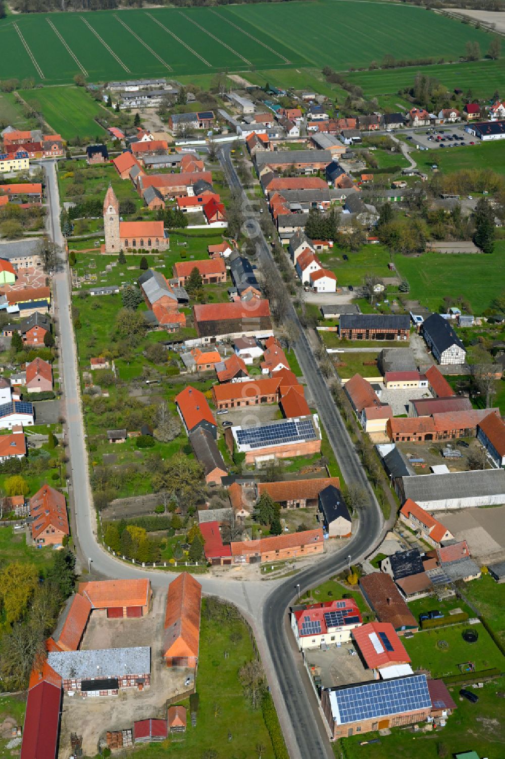 Aerial image Brunau - Agricultural land and field boundaries surround the settlement area of the village in Brunau in the state Saxony-Anhalt, Germany