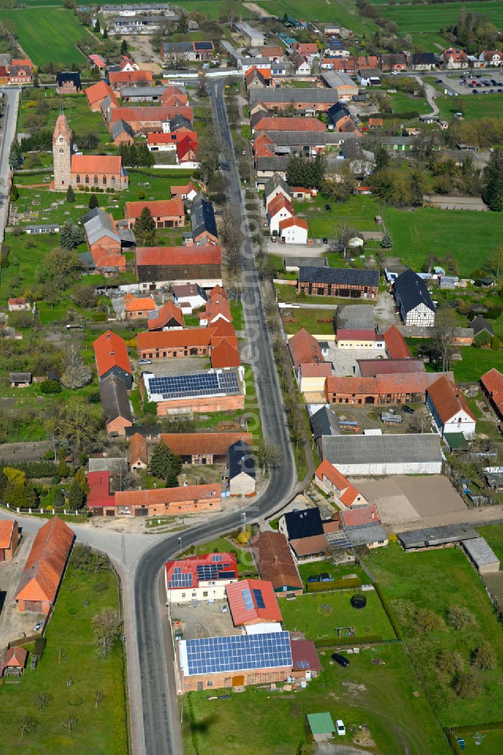 Aerial photograph Brunau - Agricultural land and field boundaries surround the settlement area of the village in Brunau in the state Saxony-Anhalt, Germany