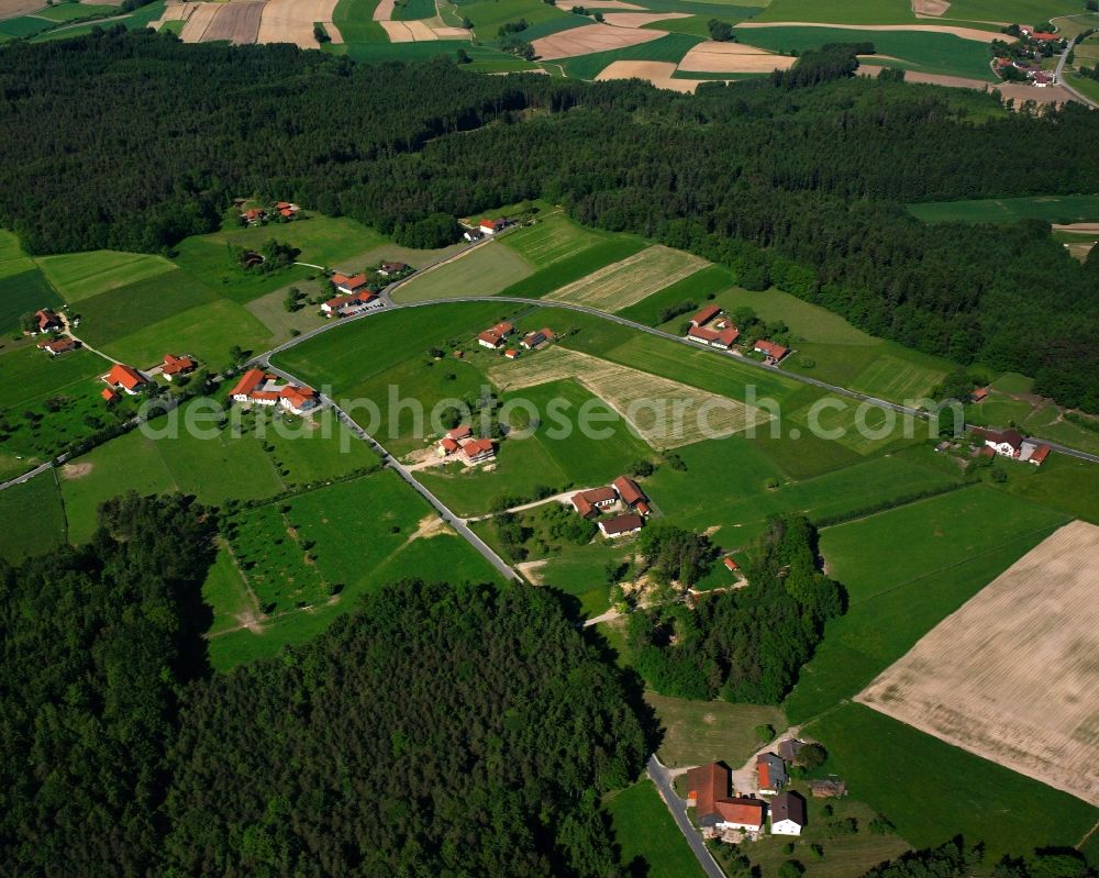 Aerial image Brunndobl - Agricultural land and field boundaries surround the settlement area of the village in Brunndobl in the state Bavaria, Germany