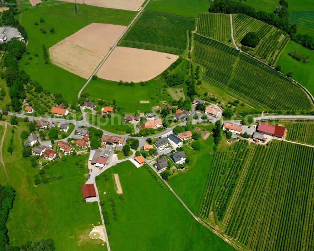 Aerial image Buch - Agricultural land and field boundaries surround the settlement area of the village in Buch in the state Baden-Wuerttemberg, Germany