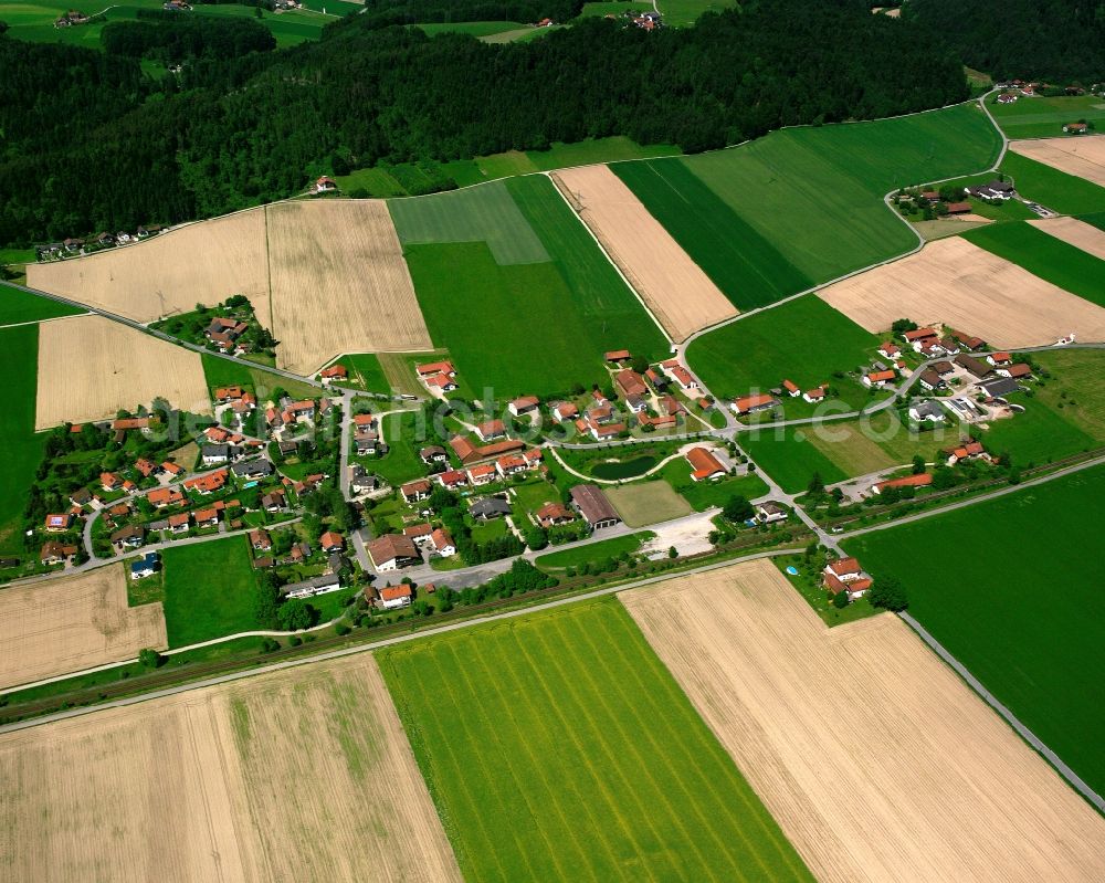 Aerial photograph Buch - Agricultural land and field boundaries surround the settlement area of the village in Buch in the state Bavaria, Germany