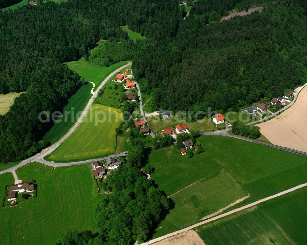 Buch from above - Agricultural land and field boundaries surround the settlement area of the village in Buch in the state Bavaria, Germany