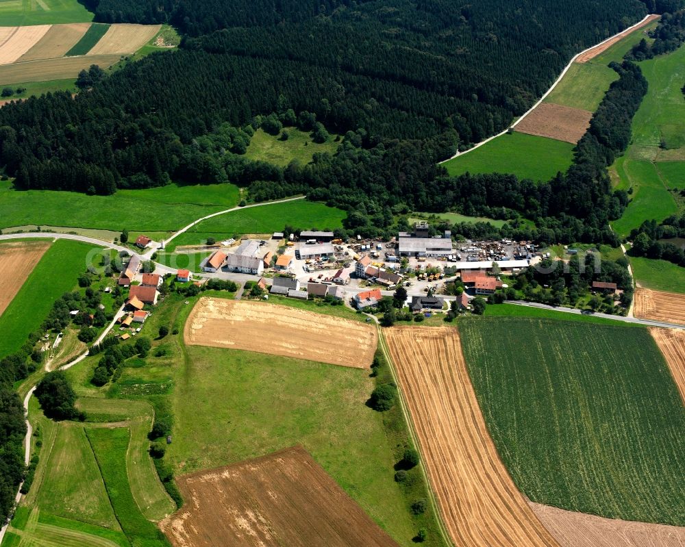 Buffenhofen from the bird's eye view: Agricultural land and field boundaries surround the settlement area of the village in Buffenhofen in the state Baden-Wuerttemberg, Germany