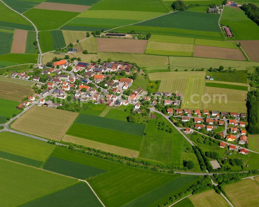 Burgrieden from the bird's eye view: Agricultural land and field boundaries surround the settlement area of the village in Burgrieden in the state Baden-Wuerttemberg, Germany