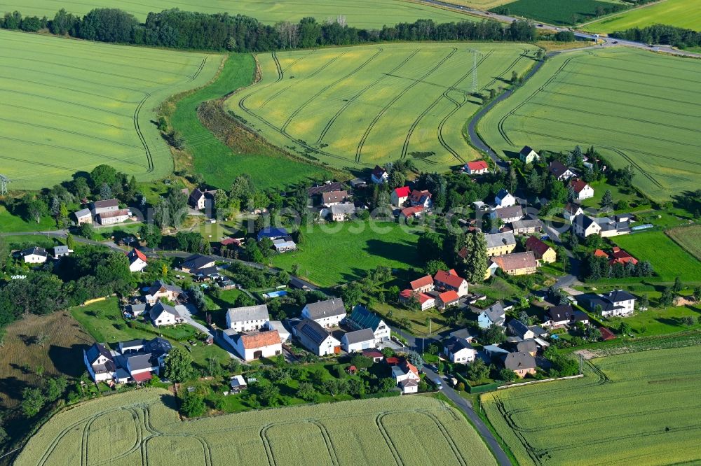 Aerial image Carsdorf - Agricultural land and field boundaries surround the settlement area of the village in Carsdorf in the state Saxony, Germany