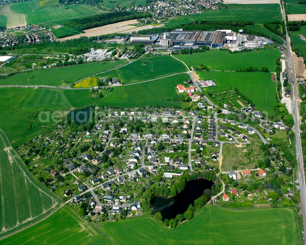 Chemnitz-Wittgensdorf from the bird's eye view: Agricultural land and field boundaries surround the settlement area of the village in Chemnitz-Wittgensdorf in the state Saxony, Germany