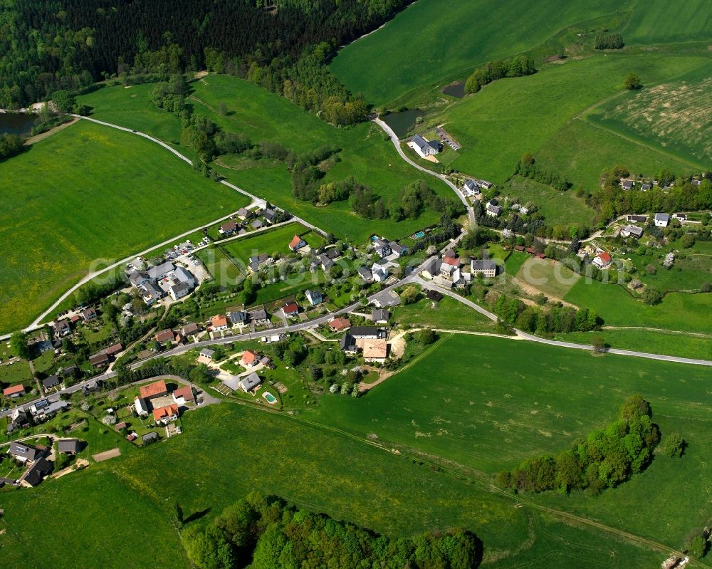 Chursdorf from above - Agricultural land and field boundaries surround the settlement area of the village in Chursdorf in the state Saxony, Germany