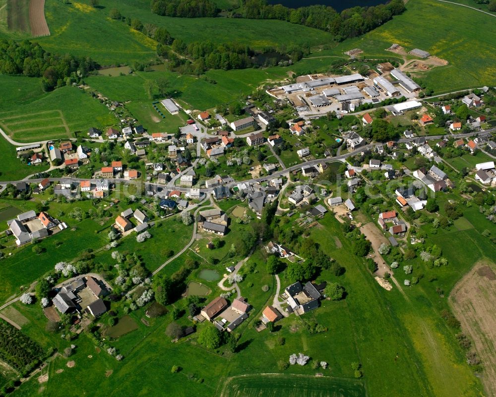 Aerial image Chursdorf - Agricultural land and field boundaries surround the settlement area of the village in Chursdorf in the state Saxony, Germany