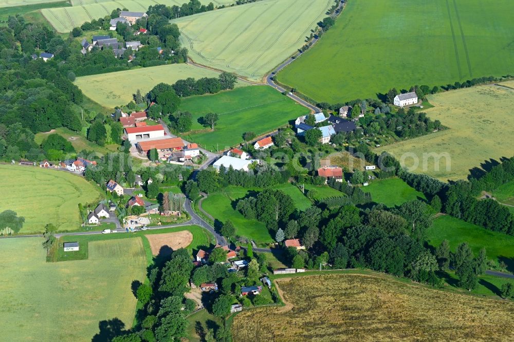 Aerial image Clennen - Agricultural land and field boundaries surround the settlement area of the village in Clennen in the state Saxony, Germany