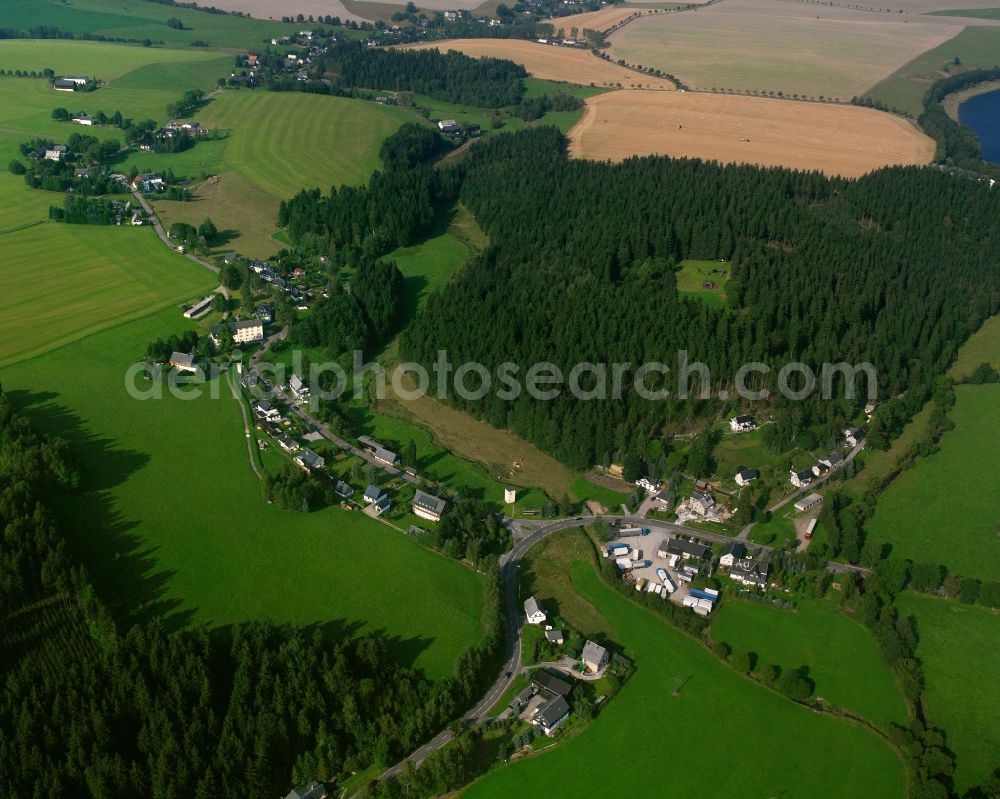 Cämmerswalde from the bird's eye view: Agricultural land and field boundaries surround the settlement area of the village in Cämmerswalde in the state Saxony, Germany