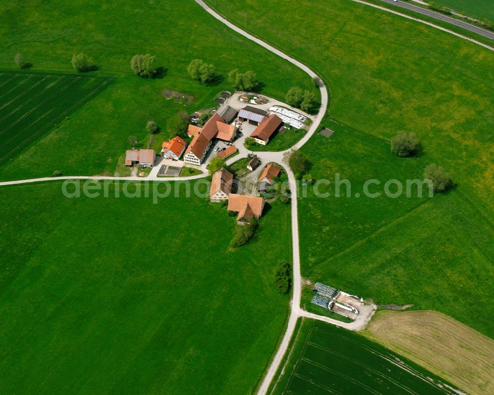 Aerial image Colmberg - Agricultural land and field boundaries surround the settlement area of the village in Colmberg in the state Bavaria, Germany