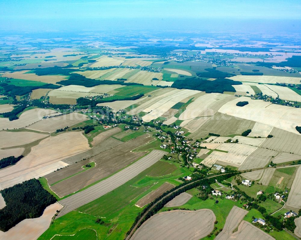 Crossen from above - Agricultural land and field boundaries surround the settlement area of the village in Crossen in the state Saxony, Germany