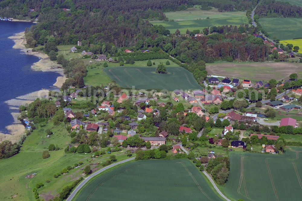 Aerial photograph Dargow - Agricultural land and field boundaries surround the settlement area of the village in Dargow in the state Schleswig-Holstein, Germany