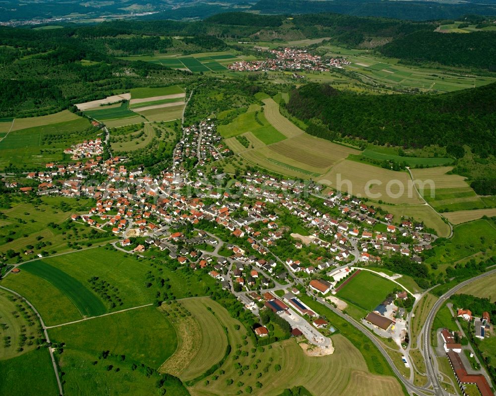 Aerial image Deggingen - Agricultural land and field boundaries surround the settlement area of the village in Deggingen in the state Baden-Wuerttemberg, Germany