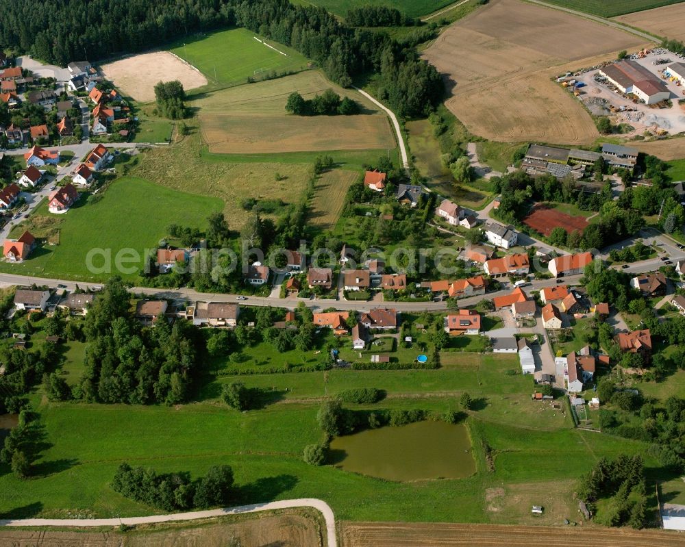 Aerial image Dentlein am Forst - Agricultural land and field boundaries surround the settlement area of the village in Dentlein am Forst in the state Bavaria, Germany