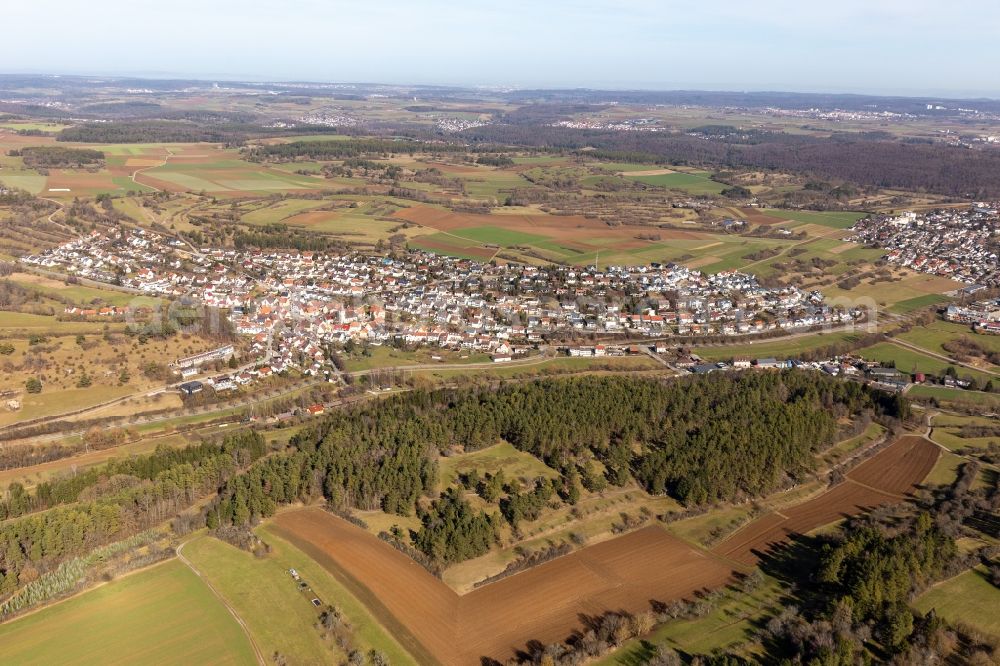 Aerial image Deufringen - Agricultural land and field boundaries surround the settlement area of the village in Deufringen in the state Baden-Wuerttemberg, Germany