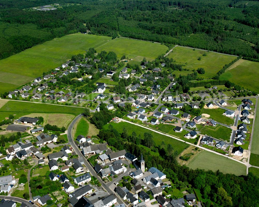 Dichtelbach from the bird's eye view: Agricultural land and field boundaries surround the settlement area of the village in Dichtelbach in the state Rhineland-Palatinate, Germany