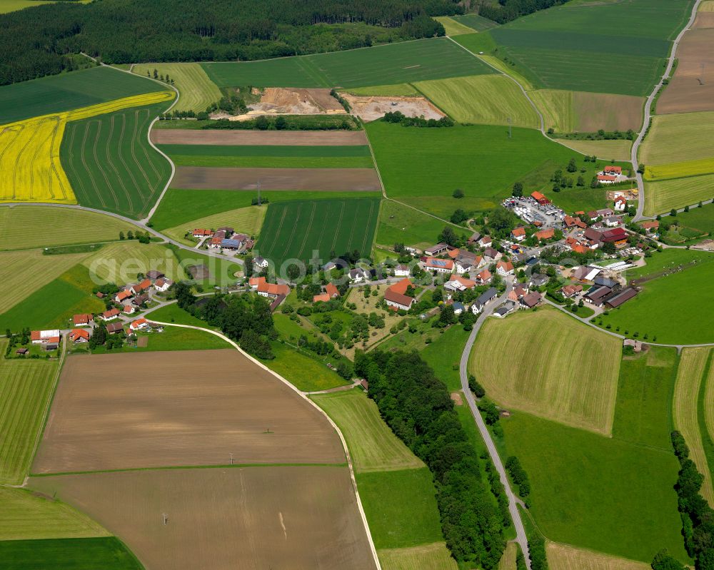 Dietenwengen from above - Agricultural land and field boundaries surround the settlement area of the village in Dietenwengen in the state Baden-Wuerttemberg, Germany