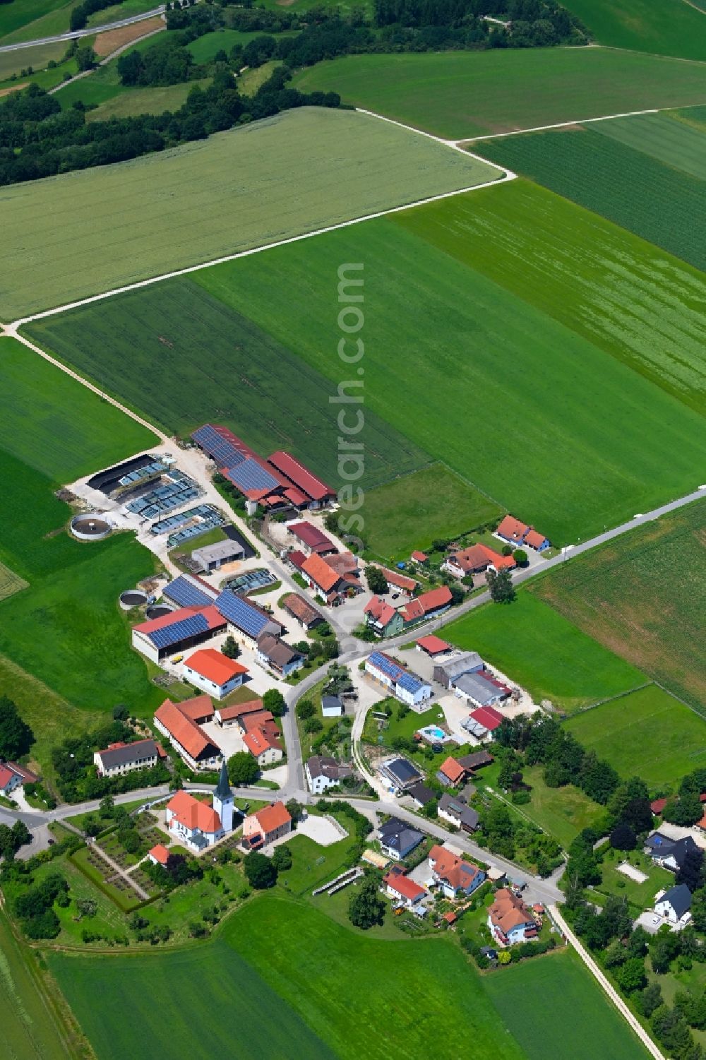 Dietkirchen from the bird's eye view: Agricultural land and field boundaries surround the settlement area of the village in Dietkirchen in the state Bavaria, Germany