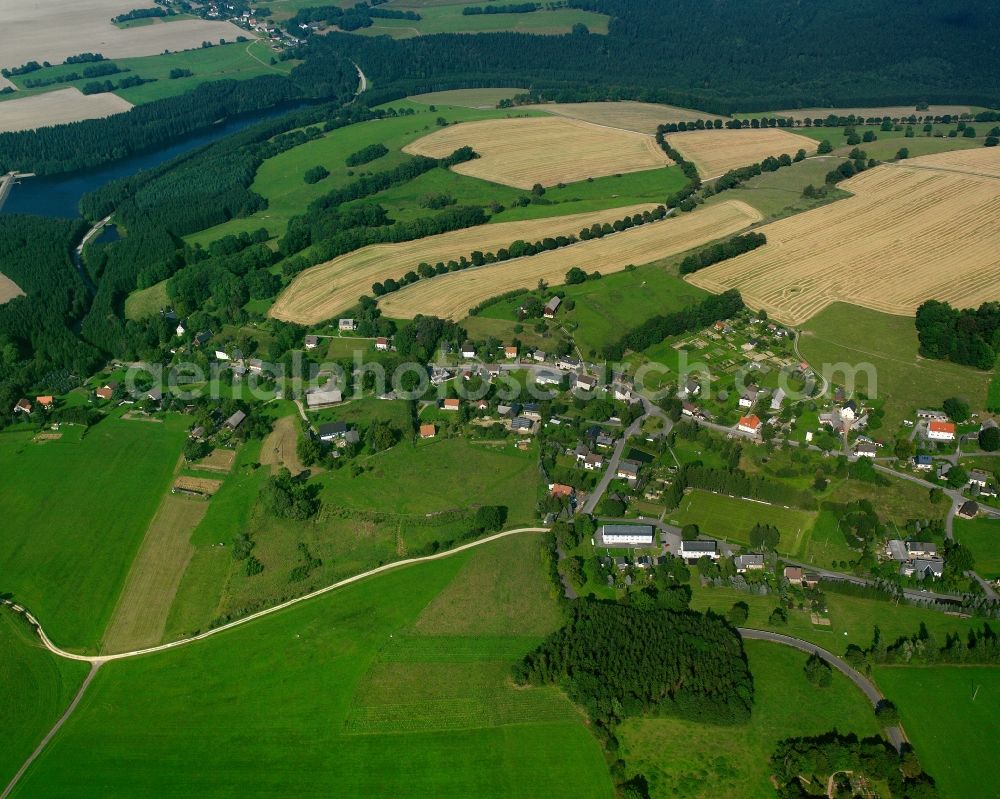 Aerial photograph Dittersbach - Agricultural land and field boundaries surround the settlement area of the village in Dittersbach in the state Saxony, Germany