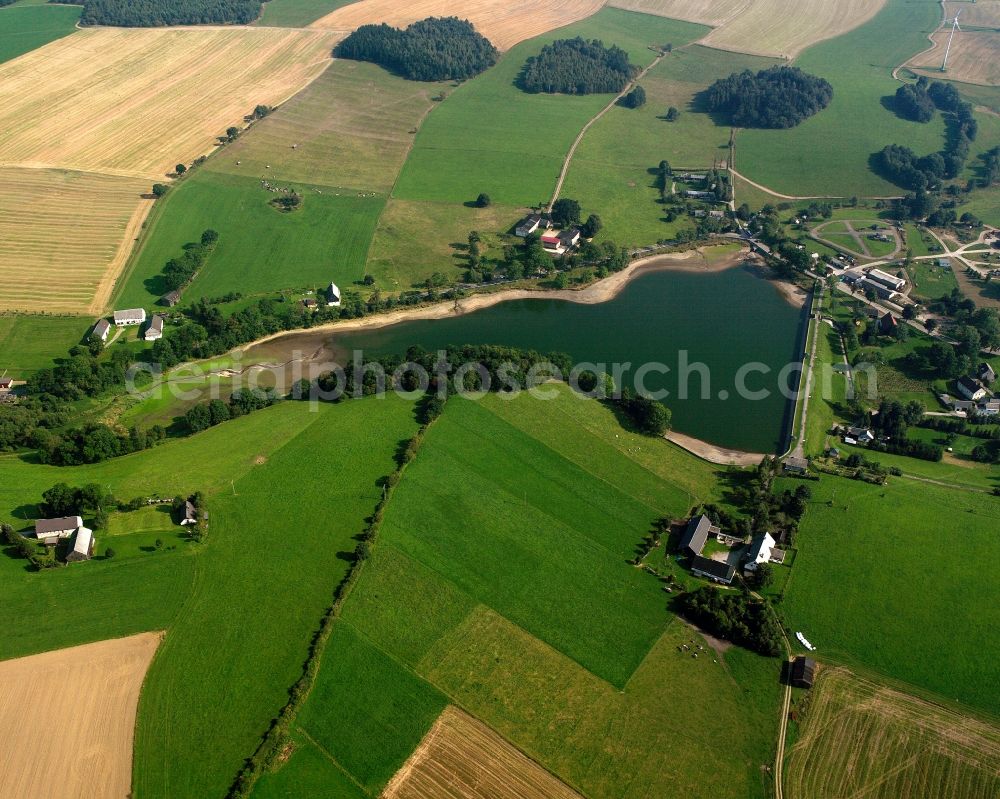 Aerial image Dittmannsdorf - Agricultural land and field boundaries surround the settlement area of the village in Dittmannsdorf in the state Saxony, Germany