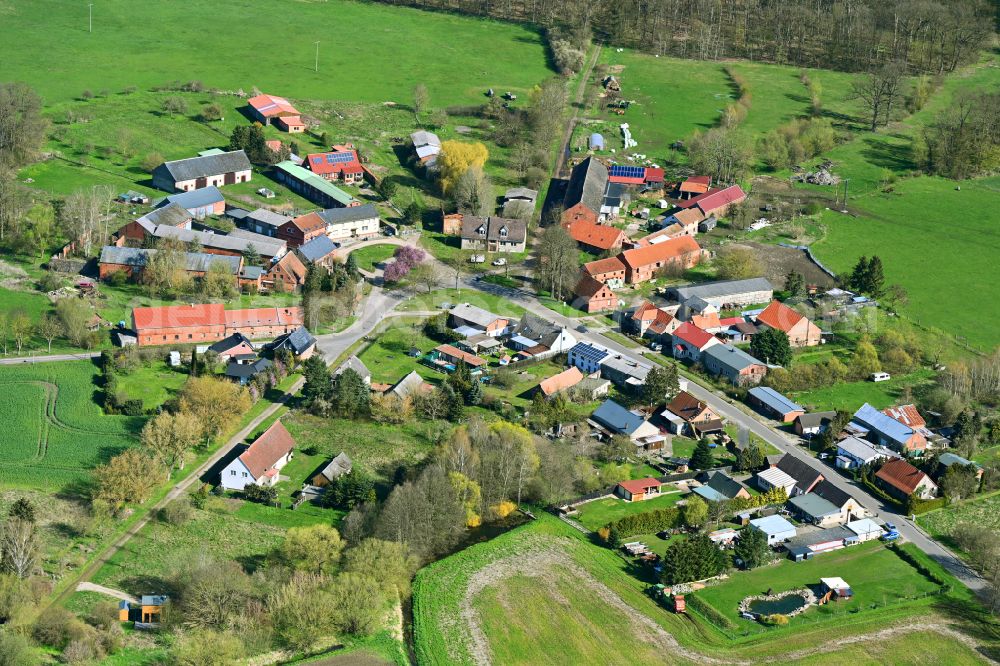 Drenkow from the bird's eye view: Agricultural land and field boundaries surround the settlement area of the village in Drenkow in the state Mecklenburg - Western Pomerania, Germany