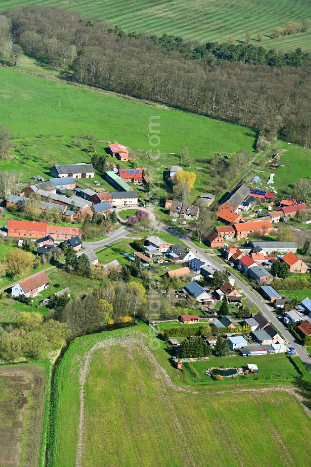 Aerial image Drenkow - Agricultural land and field boundaries surround the settlement area of the village in Drenkow in the state Mecklenburg - Western Pomerania, Germany