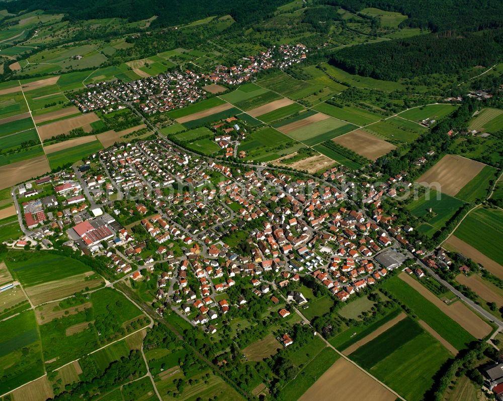 Aerial image Dürnau - Agricultural land and field boundaries surround the settlement area of the village in Dürnau in the state Baden-Wuerttemberg, Germany